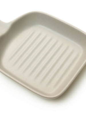 Classic ceramic casserole dish with handles on white background