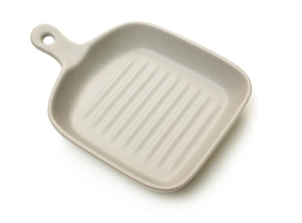 Classic ceramic casserole dish with handles on white background
