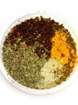 Spice set in plastic jar isolated on white, top view